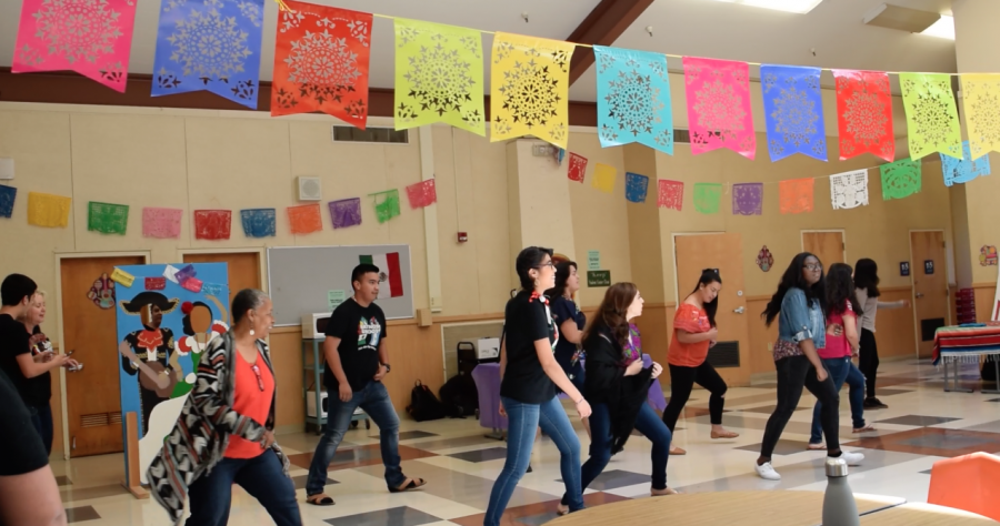 A well known Mexican dance titled, El caballo dorado, unites students and teachers as they dance. 