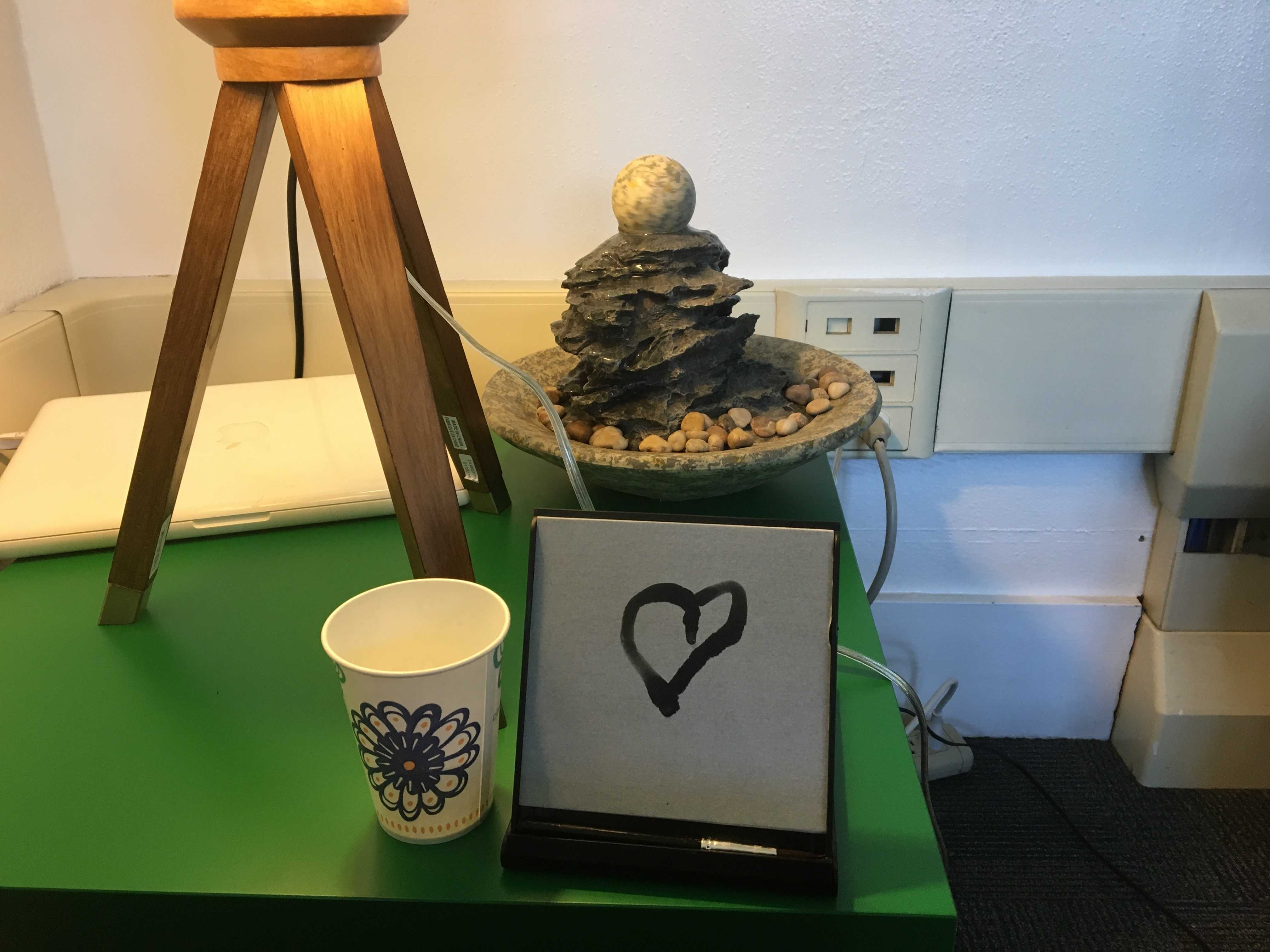 A calming fountain is set up on a side table, accompanied by a "Buddha board", where a student can draw a picture with water, and then see it slowly fade as the water dries. Spector explained why the Wellness Center decided to include it. “The board reminds us about living in the moment. It’s reinforcing that things aren’t permanent.” 