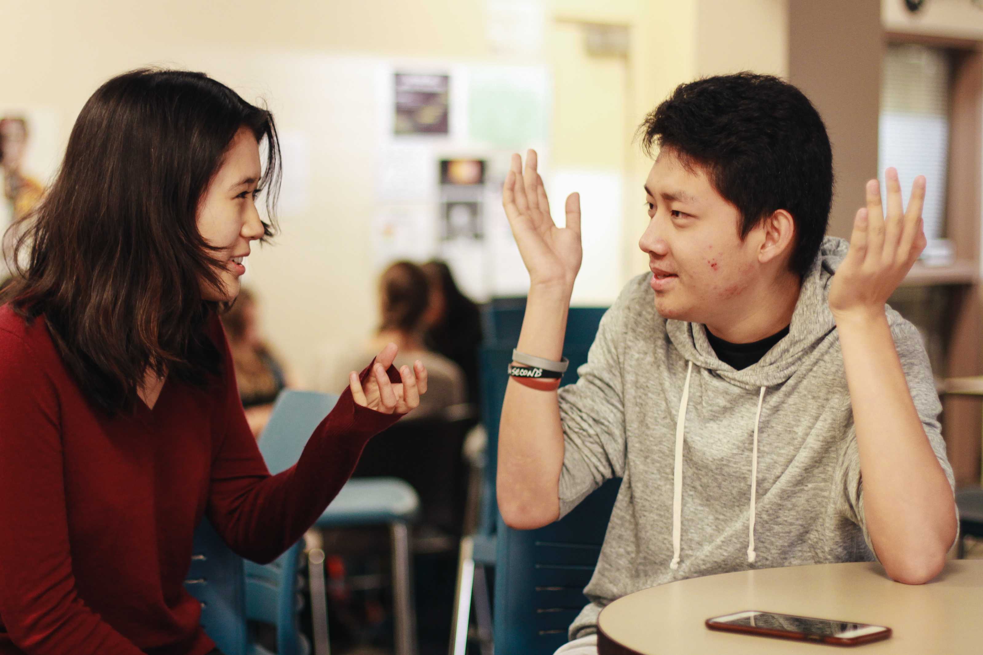 Seniors Frances Zhuang (left) and Barry He (right) discuss their upcoming debate tournaments. Both have debated on the National Circuit since 2015. "After you compete for so long, debate becomes part of you," Zhuang said. "I have difficulties separating myself from debate."