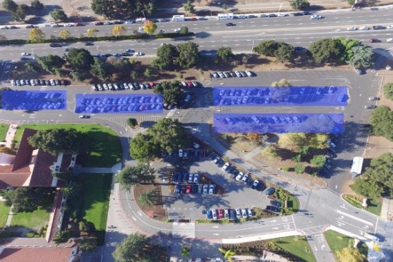 An aerial photo of Palo Alto High School's parking lot. The light blue rectangles represent the proposed locations for solar panels. Photo: Jevan Yu