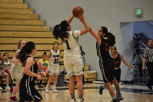 Recap: Girls' basketball kicks off quad night with a win