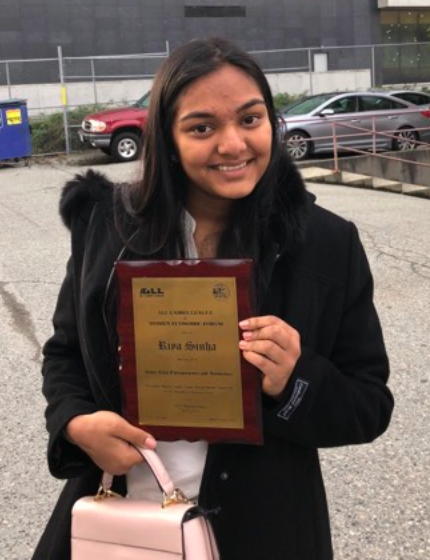 Sinha poses with her Iconic Teen Entrepreneur plaque at the Women Economic Forum in Vancouver. This award is the first Sinha has won for her website so far. According to Sinha, in addition to receiving the award she spoke on a panel about “how women in media can impact change”. Photo: Gunjan Sinha
