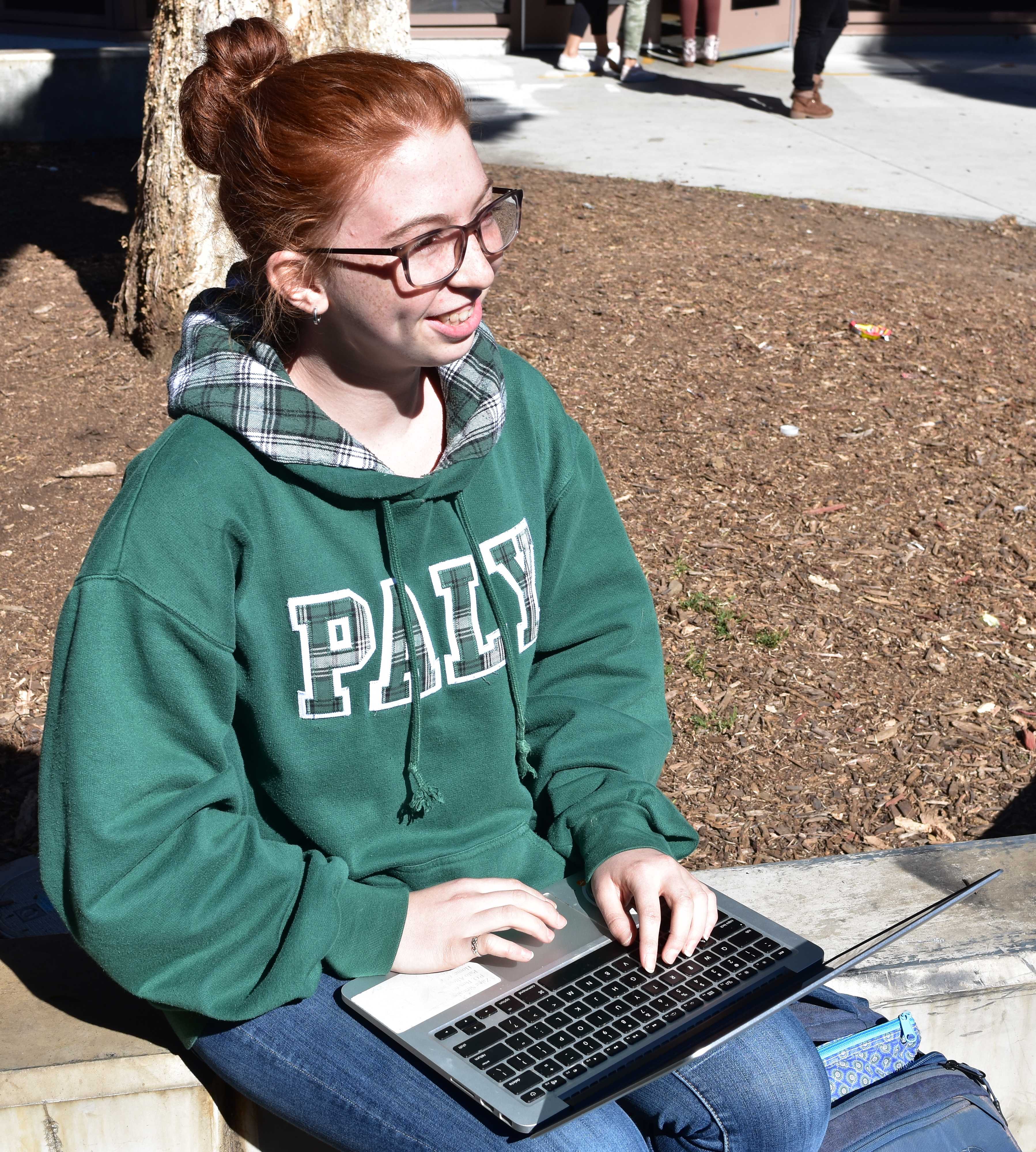 Junior Zage Phillips works on a coding assignment for her Advanced Placement Computer Science class. Phillips expressed support for the idea of a mandatory CS requirement, but added that students should be able to choose from a variety of programming-related classes. "I think it would be a great idea for students to have a one semester requirement of some sort of programming class[[.]] ... However, I do understand that programming isn't everyone's strong suit, so I think it would also be nice to create more programming and software engineering classes at Paly so there is something for everyone." Photo: Nisha McNealis