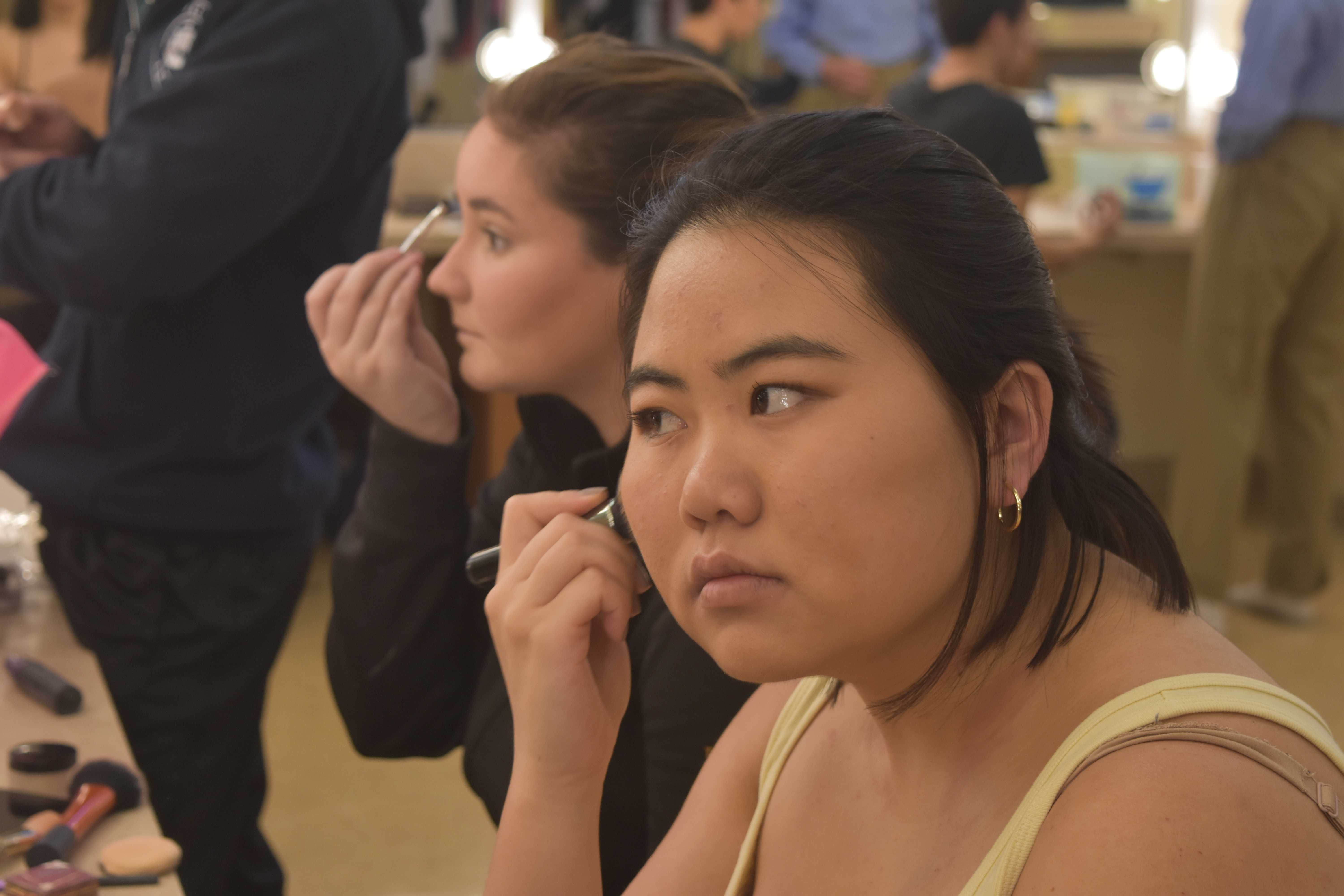 Palo Alto High School senior Emily Zhang applies her make up as she prepares to rehearse for the upcoming One Acts. One Acts, which will feature eight student-directed and written plays, two of which were student written, will be running throughout May 3 and May 5 in the Performing Arts Center. “It’s also nice to direct as the last thing, because I have been acting in One Acts, and have done a lot of acting for Paly theater, but I haven’t done any student directing, yet, for Paly theater,” Zhang, who is directing "Cinnamon Rainbow," said. “So it’s kind of fun to finally be able to do that.” Photo: Julia Qiao