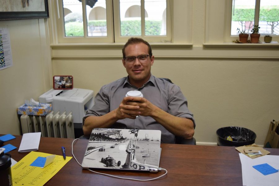 Assistant Principal John Christiansen enjoys a cup of coffee while discussing his transition to Palo Alto High School, his responsibilities at Paly and his passions outside of his career. Although part of the school's administration team is new this year, Christiansen said that consistency to years prior can be expected. 