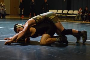 Wrestling: Vikings triumph over crosstown rival Gunn