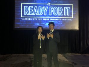 DECA club attends state conference, qualifies for nationals