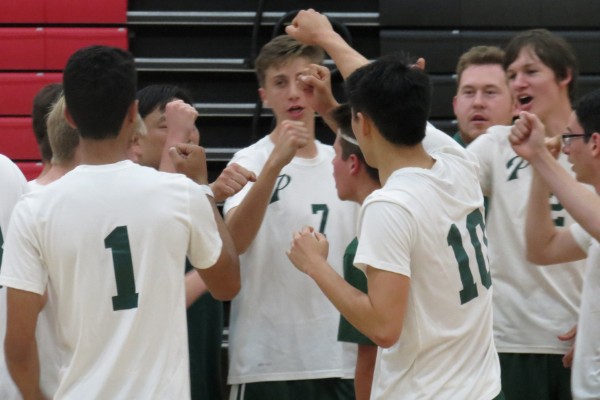 The Palo Alto High School boys’ volleyball team rejoices in their victory against Gunn High School 3-0 on Tuesday. Coach Ed Yeh listed the players’ determination to win as a standout quality. “I liked their steel,” Yeh said. “Your character isn’t tested during good times, your character’s tested during hard times … we showed a lot of discipline on our side.” Photo: Benjamin Huang