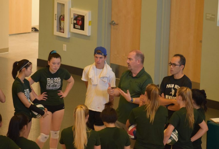 Coach Chris Crader talks to the girls volleyball team during practice. Crader is the new volleyball coach and is getting ready for the season. Im just excited to see what were capable of as the season goes on, as we all get to know each other a little bit better, Crader said. Photo: Ria Pai