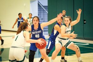 Girls' basketball wins first game of the season