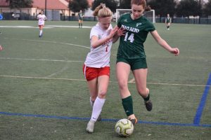 Girls' soccer takes home first conference win of season