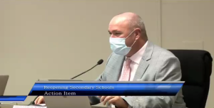 Board shrugs off concerns, supports hybrid plan for January