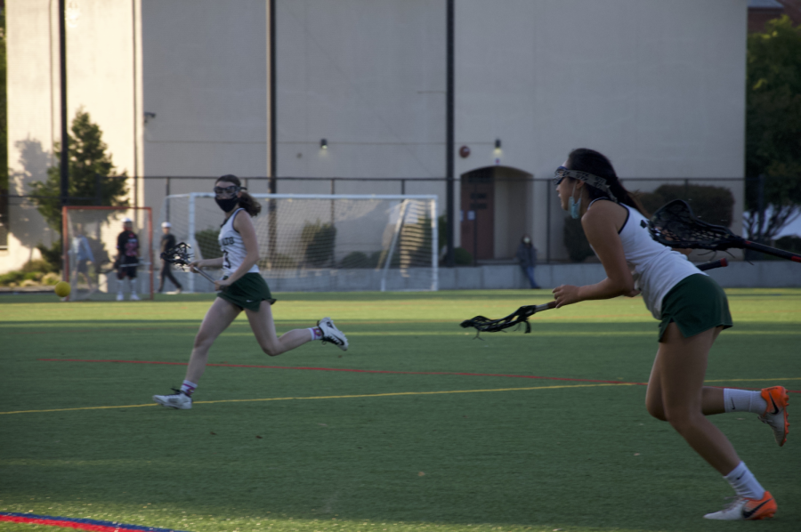 Junior Anika Chang rushes for the ball.