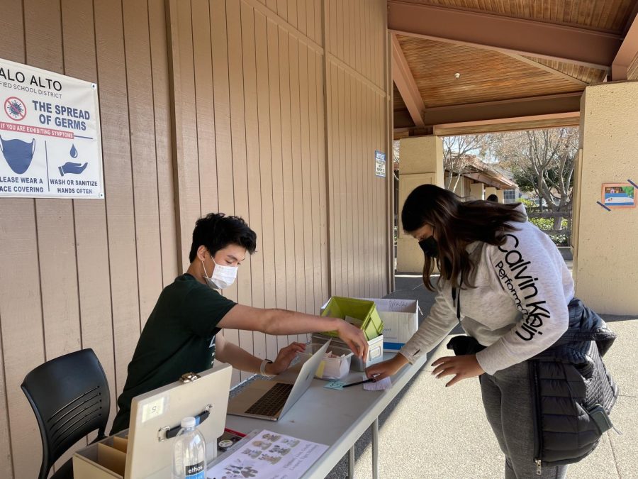 Senior Nisha Mata purchases a Valgram from Palo Alto High Schools Associated Student Body in preparation for the Valentines Love Week. 