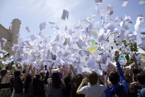 Senior celebration features performances, speeches, paper toss