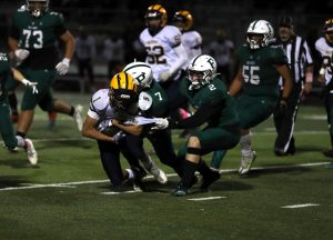 Vikings qualify for playoffs by defeating Trojans