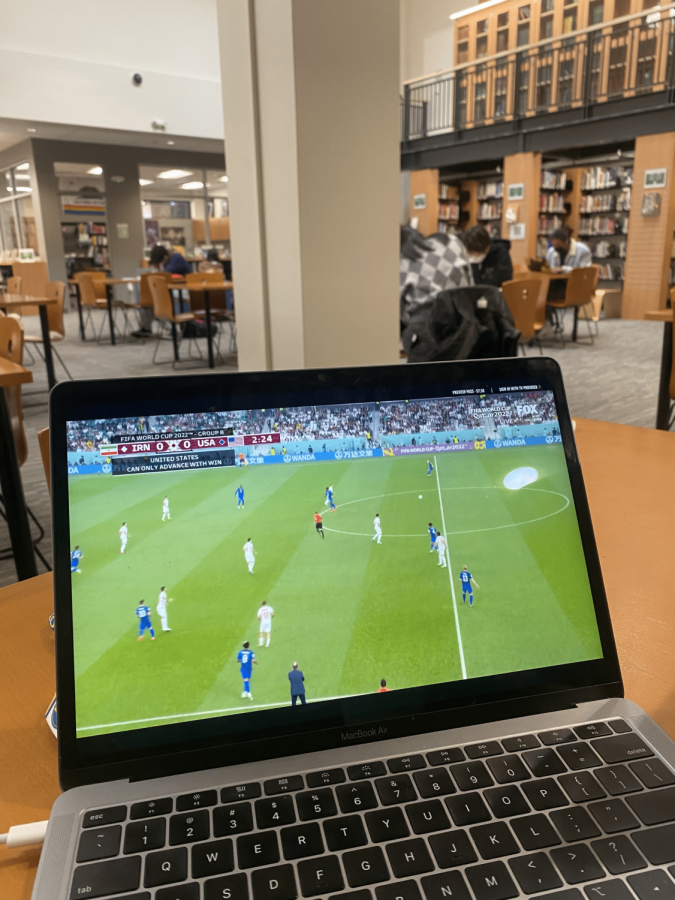 Students watch the USA vs. Iran match on their computers in the library on Tuesday. [Photo: Lucianna Peralta]