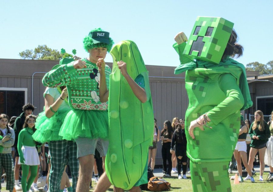 Sophomore Heiren Noone (left) sports her bright green Minecraft costume during the best-dressed competition at brunch Friday on the Quad. Noone said she has been enjoying the dress-up aspect of this weeks Spring Spirit. “I really like best-dressed activities and I love spirit week,” Noone said. “I think that the more costume-y days are my favorite.” (Photo: Kristine Lin)