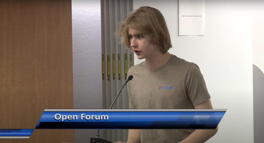 Sophomore Aleksey Valouev speaks during the open forum section of an April 18 school board meeting regarding the Palo Alto Unified School District’s removal of Multivariable Calculus and Linear Algebra as dual-enrollment classes. Valouev was one of over 50 students involved with the writing of an open letter to the district commenting on their perceived unfairness of the change and advocating for its appeal. In the meeting, Valouev said Multivariable and Linear Algebra are an integral part of the math pathway for students pursuing advanced math courses past high school. “This decision has affected each and every single one of us on an individual level,” Valouev said. “[It’s] severely limiting our options for continued math learning during our junior and senior years.” (Photo: Screenshot of PAUSD School Board Meeting Youtube Video)