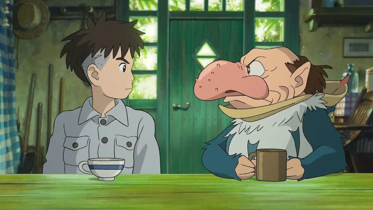 Mahito stares down his gray heron companion in The Boy and the Heron. (Photo: Studio Ghibli)