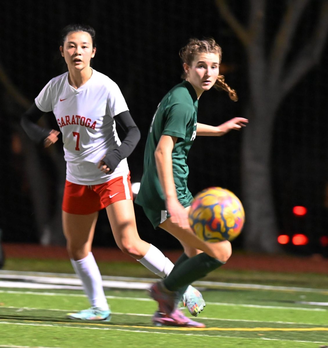 Palo Alto High School 9th grader left back Ellie Knott prepares to run after the ball during the girls varsity soccer game on Tuesday at home. The Vikings won, 2-1, against the Falcons, keeping the Vikings at third in the league. According to Viking sophomore center back Reyes Aronson, the Vikings play solidly as a unified team. I feel like our team together as a whole played really good, Aronson said. We were switching it really well, keeping the ball, ... doing things we should be doing. (Photo: Andrew Zhao)
