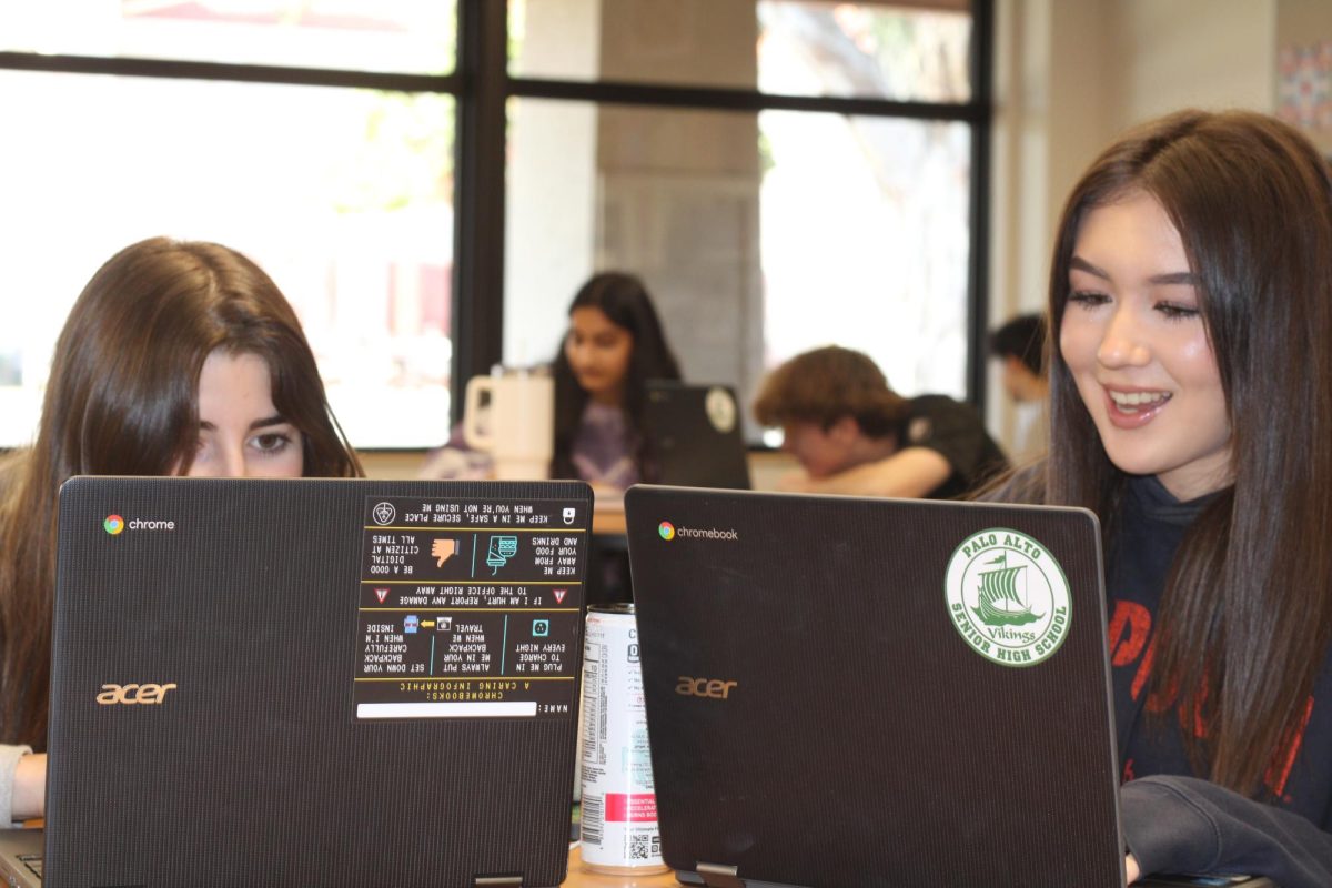 Sophomores Lara Saslow (left) and Sophie Oshige (right) do their homework using school-issued Chromebooks in the Library. Loaner Chromebook check-outs stopped from the Palo Alto High School library starting March 18. Saslow said she relies on Chromebooks for schoolwork. Chromebooks are crucial for Paly students, Saslow said. I get all my work done on my Chromebook both in and out of school.