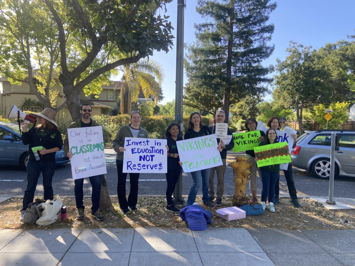 Palo+Alto+High+School+teachers+participate+in+a+walk-in+last+week+by+Churchill+Avenue+prior+to+Mondays+announcement+of+a+tentative+agreement+with+the+Palo+Alto+Unified+School+District.+The+event+was+one+of+the+efforts+by+the+union+to+raise+awareness+about+the+recent+negotiations+between+the+Palo+Alto+Educators+Association+and+the+district.+There+have+been+teachers+at+each+site+making+some+noise%2C+getting+people+to+honk+their+horns+and+rallying+for+kids%2C+said+Erin+Angell%2C+a+PAEA+site+representative+who+helped+to+organize+the+event.