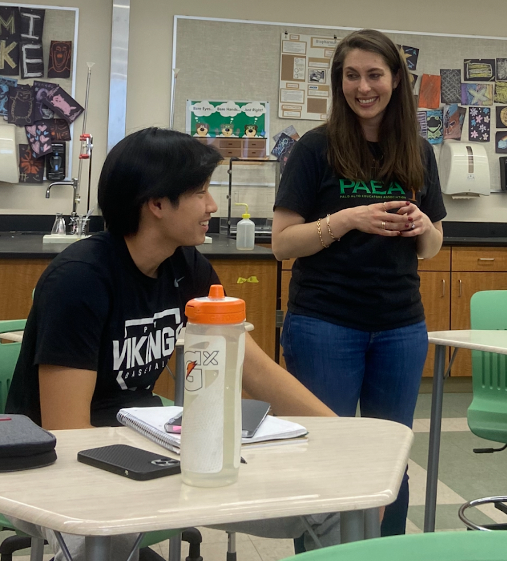 Alicia+Szebert+discusses+the+assigned+chemistry+problems+with+sophomore+Jake+Liu+during+work+time.+Szebert%2C+a+Palo+Alto+High+School+chemistry+teacher+and+PAEA+member%2C+supports+the+union%E2%80%99s+efforts+to+increase+teachers%E2%80%99+pay.+Daniel+Nguyen%2C+a+math+teacher+and+site+representative+for+the+PAEA%2C+shares+Szeberts+perspective.+I+think+its+important+that+teachers+get+paid%2C+Nguyen+said.+We+want+to+work+with+the+best+and+to+recruit+the+best.