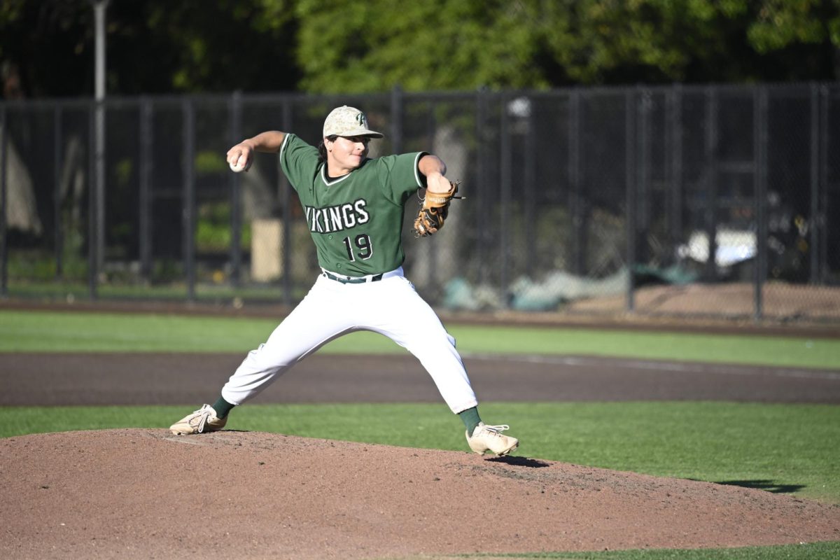 Junior William Hickey throws his fastball in a regular season game. According to Hickey, the excitment going into todays game is something he hasnt felt before. Its kind of a nervous feeling, Hickey said. But in the best way possible.