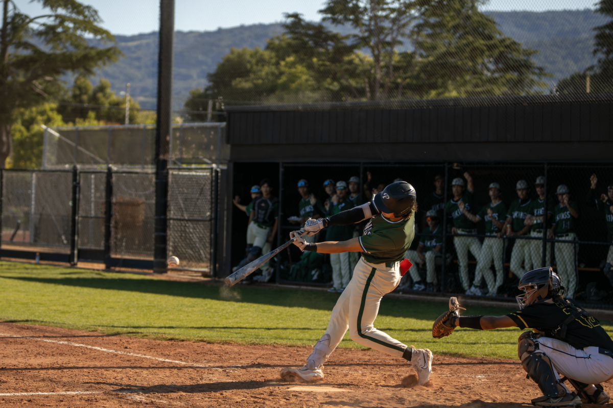 Palo Alto High School senior shortstop Charles Bates smokes a ball down the left side of the field. The Vikings defeated the Mountain View High School Spartans, 9-8, after a rocky start in the first two innings. According to Viking head coach Peter Fukuhara, the Vikings have experience with climbing out of score deficits. “Our club is so deep into our season,” Fukuhara said. “We’ve played 24 or 25 games, and were pretty battle-tested by this point. Weve been down before, so we know what that feels like. Our team doesnt panic.”