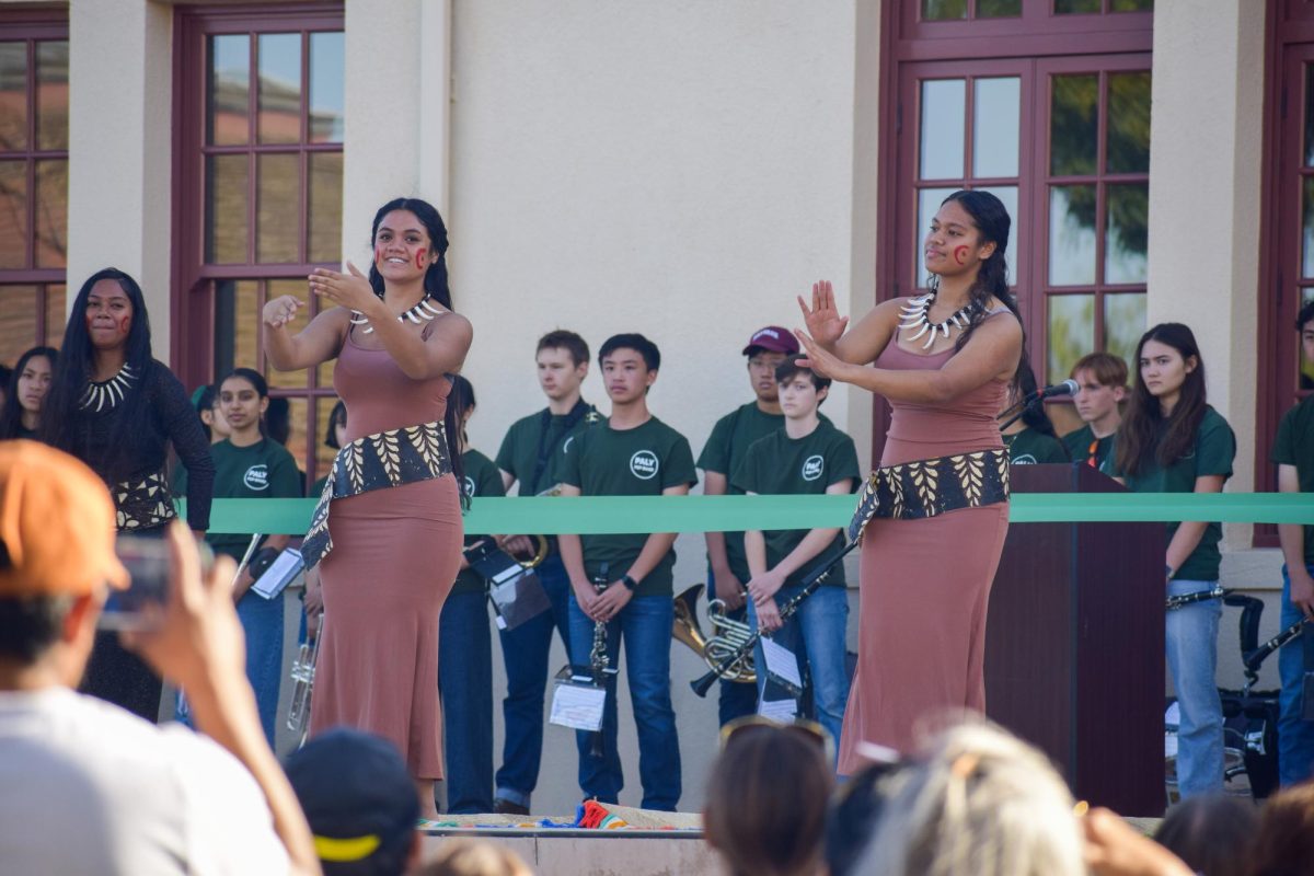 The Polynesian Club performs a cultural dance during the Parent Fair this evening at the Tower Building. According to senior Anaiah Latu (right), she was proud to showcase her culture. "The dance performance went well," Latu said. "We were able to come together and perform as a group and show as many people as we could about the Polynesian culture as well as a traditional dance. I am proud of the attire and that the practice and dress rehearsal leading up to the event went smoothly." (Photo: Kristine Lin)