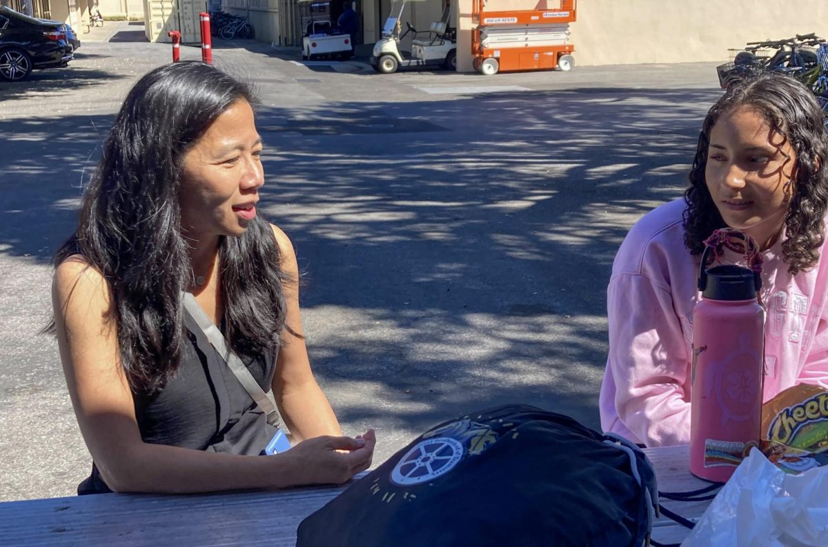 New assistant principal Rebecca Shen-Lorenson chats with students at Palo Alto High School. According to Shen-Lorenson, she has enjoyed her first few weeks on campus, familiarizing herself with the culture. "Right now, it's a lot of learning for me, learning from you all and hearing from you all there are changes that you want to make because that's always good feedback," Shen-Lorenson said. "I'm really happy to be here and I've really enjoyed my first three weeks here on campus."