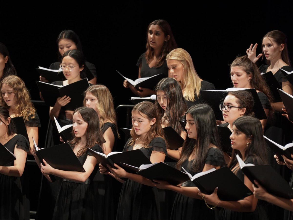 Paly Choir performs snippets of "Carmina Burana" on Sunday as a preview for the next joint concert with Schola Cantorum. According to senior Aiden Chen, the preview concert gave audience a taste of the challenging repertoire that is to come for this season. "This is meant to just showcase what we've been learning, these difficult classical pieces, as well as how big and great our choir is nowadays," Chen said. "On Oct. 27, we will be performing the full 'Carmina Burana' with Schola Cantorum and selected parts of the orchestra from Paly." 
