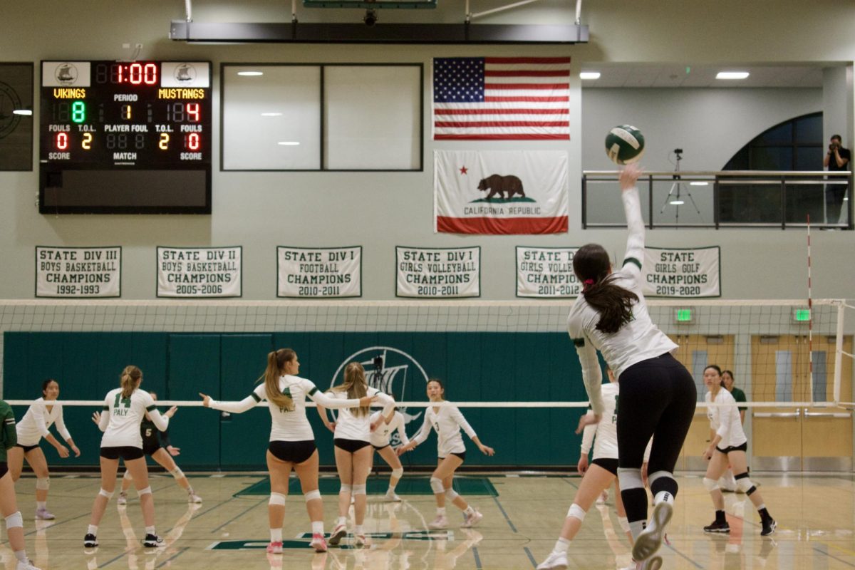 Paly sophomore outside hitter Maura Hambly serves the ball during the Vikings' eighth match of the season at home against the Homestead High School Mustangs. The Vikings won, 3-2, continuing their winning streak. “Our goal this season is to make it into open for CCS and then to try to go far in Norcal,” Hambly said.