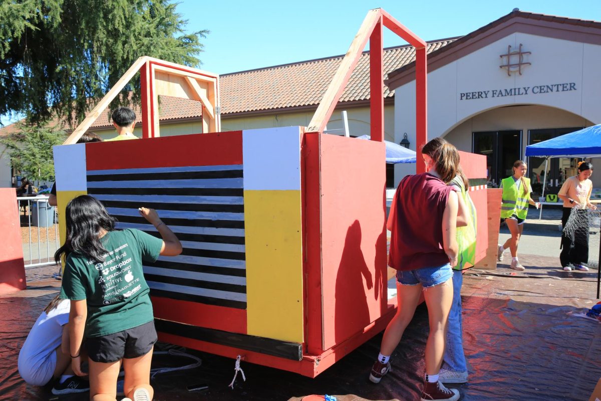 Sophomores putting final touches on the front of their fire truck. Palo Alto High School students are gearing up for the final Spirit Week rally with the class floats. According to sophomore Ava Knox, the sophomores are building a pulley system on top of the fire truck. “I’m really excited to see the whole thing put together during the parade,” Knox said.