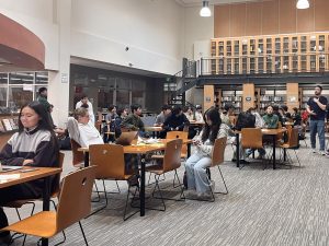 Dozens of students roam around in the library Tuesday morning after a lockdown canceled the American Mathematics Competition at Palo Alto High School. A retake is unlikely after a lockdown announcement sprung the school into a lockdown. Freshman Brian Chung said he put in a lot of effort leading up to the exam and felt upset with the disruption. 
“I feel really pissed," Chung said. "I worked really hard for it the whole year. I can’t believe it got canceled."