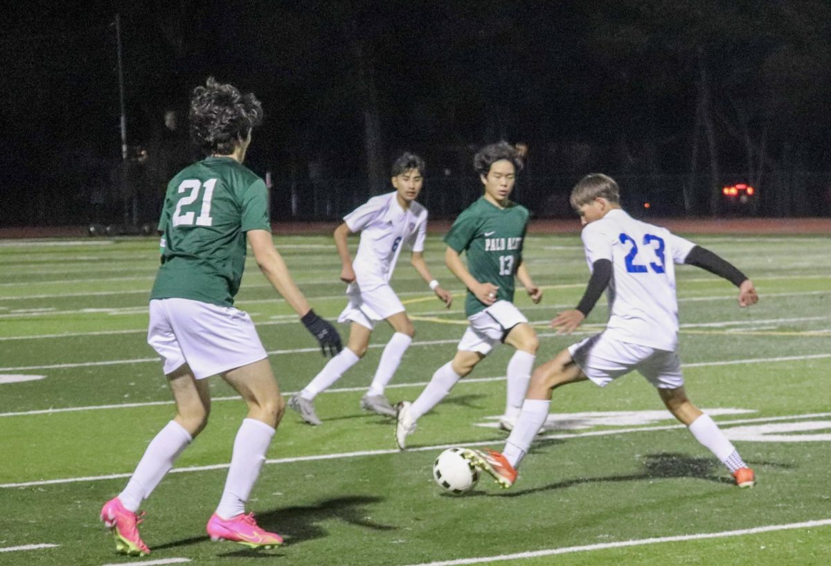 Palo Alto High School Junior James Park and Senior Lucas Yuan defends against Santa Teresa Saints midfielder. The fast-paced victory 4-0 win at home on Dec 6 continued the Viking's undefeated record. According to Paly Coach Luiz Lodino, "They're here before seven in the morning, before we start, because that's the time that we train." 