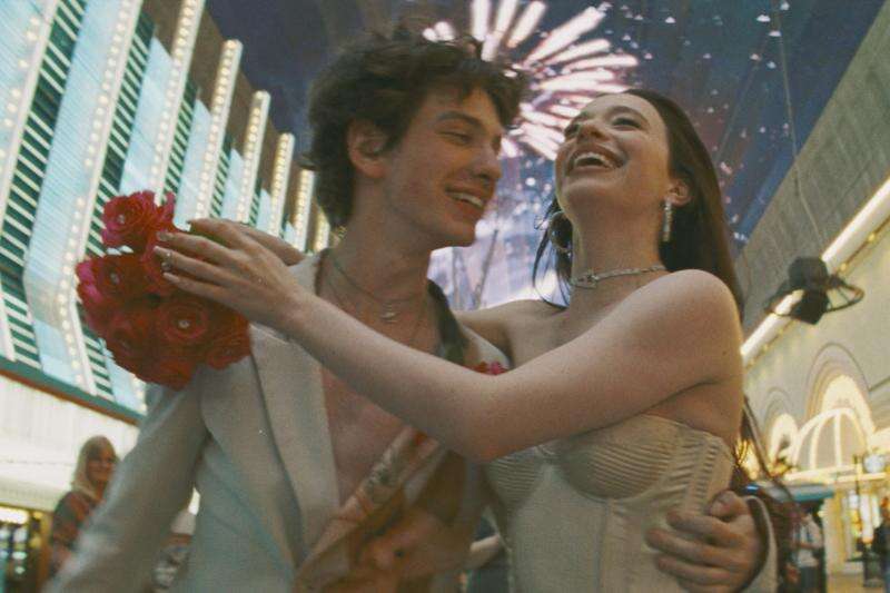 Anora "Ani" Mikheeva, a stripper living in Brooklyn, celebrates after marrying Ivan “Vanya” Zakharov (Mark Eydelshteyn) in “Anora.” The romantic comedy drama film is nominated for six awards at the 2025 Oscars. 