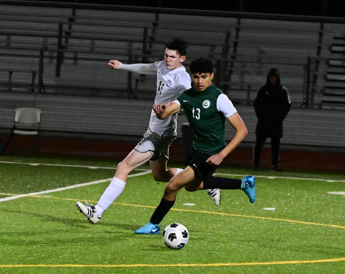 Viking Junior Khrisar Magna takes control of the ball against a Mustang midfielder Friday night at Palo Alto High School. The hard-fought game ending in a 0-0 tie marked a non ideal result for the Vikings. Viking senior defender Lucas Yuan said the Vikings just couldn’t find the back of the net despite their attempts. “If you look at the stat line, we had way more shots than they did, but the issue was we were just not able to convert it," Yuan said. “At the end of the day, the score line tells the story. It's 0-0.”