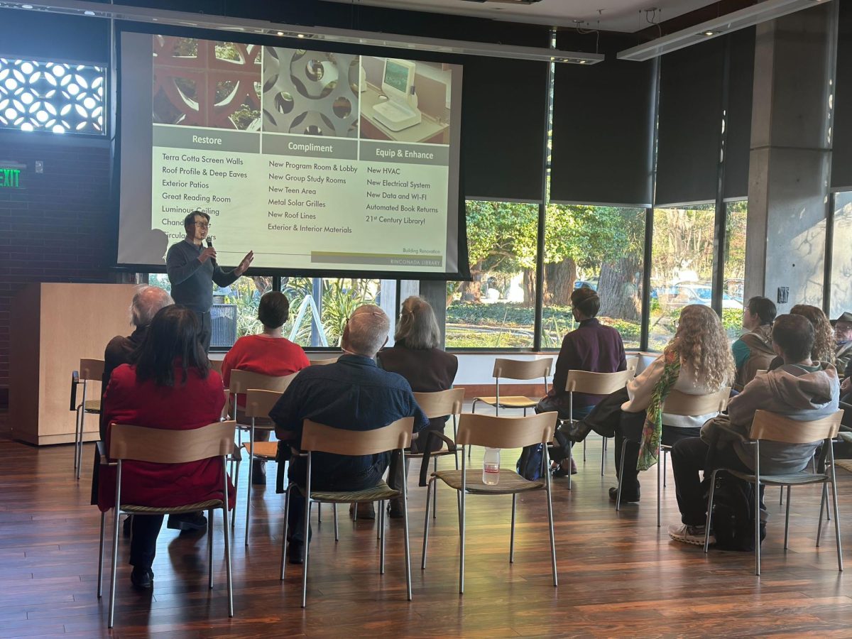 Community members gather for the 10th anniversary celebration of the Rinconada Library on Saturday as they listen to Jonathan Hartman, principal architect at Group 4 Architecture, showcasing the remodeling done to the interior of Rinconada Library in 2015. According to Library Services Manager RuthAnn Garcia, this presentation was done to honor the history behind the building. “The architectural presentation will really appeal to those who love the modern updates to historical buildings,” Garcia said. “Rinconada was renovated and renamed 10 years ago, but our ‘Main’ Library opened in 1958.”