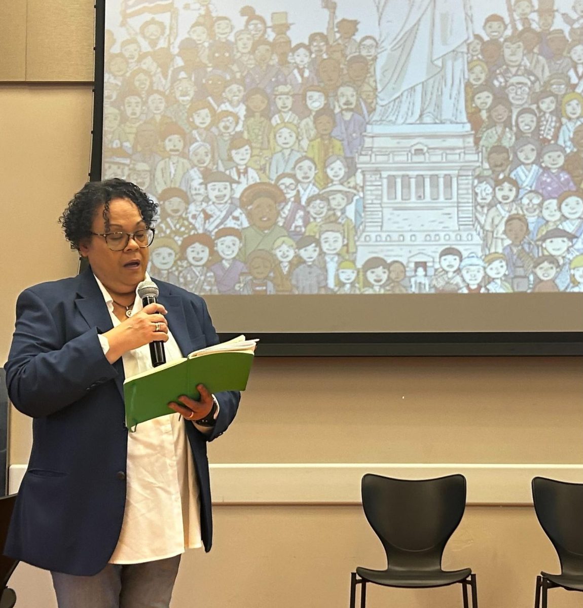 Julie Lythcott-Haims, Palo Alto City council member, speaks at the "Know Your Rights" meeting last Thursday. According to Lythcott-Haims, the priority is to keep people protected. "The City of Palo Alto is determined to be a community that keeps folks safe and everybody knows they matter," Lythcott-Haims said.