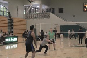 Staff defeat students in volleyball match
