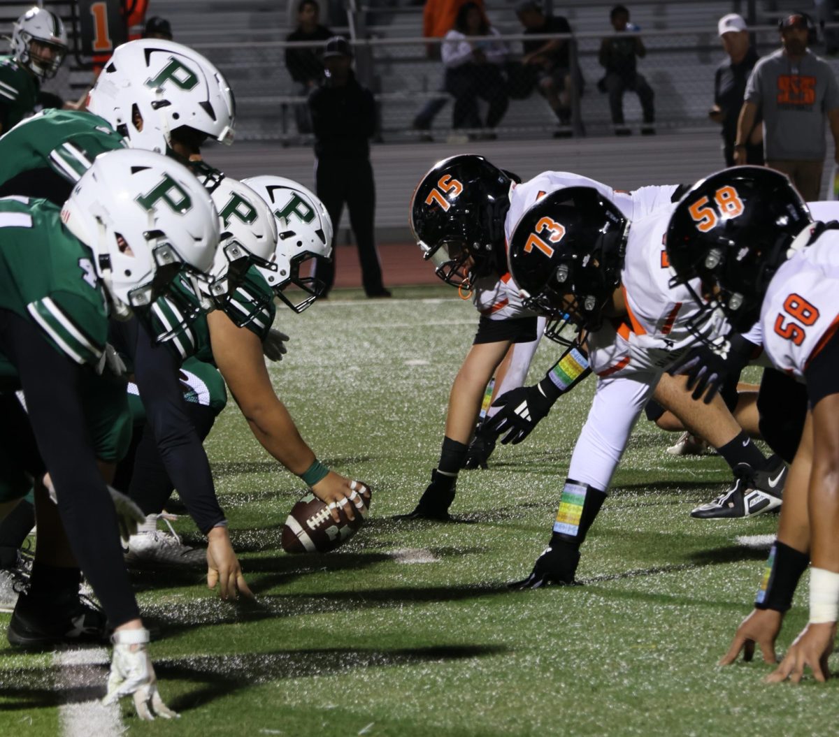 Vikings prepare for the snap in the game between the Vikings and the San Mateo Bearcats Friday night at home. 
According to Viking senior wide receiver Kacey Washington, the Vikings’ strategy was to restrict the Bearcats’ runs. "We knew they loved to run the ball, so we just focused on being able to stop that run," Washington said. 