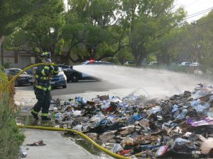 Fire department handles trash fire, urges proper waste disposal