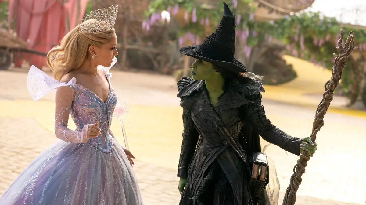 Elphaba (Cynthia Erivo) and Glinda (Ariana Grande) quarrel after Glinda gives Nessa's ruby slippers to Dorothy, sparking Elphaba's furious reaction in "Wicked: For Good." 