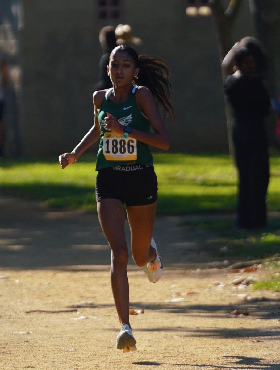 Palo Alto High School senior Amaya Bharadwaj competes during the fall cross country season. Bharadwaj qualified for Nike Cross Nationals, becoming the first runner from Palo Alto High School to advance to the national meet. “You just have to run your fastest and hope you are going to be in the top five,” Bharadwaj said.