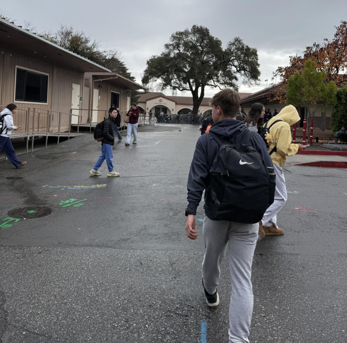 Palo Alto High School students walk to their next class by moving around the portables by the Palo Alto High School quad. According to Jerry Berkson, assistant principal, he is already coming up with solutions for where services currently available in the portables will move to. “I know there’s an open classroom in the 400s off the bat.” Berkson said. “We’ll probably have to go back to teachers sharing rooms in certain places.”