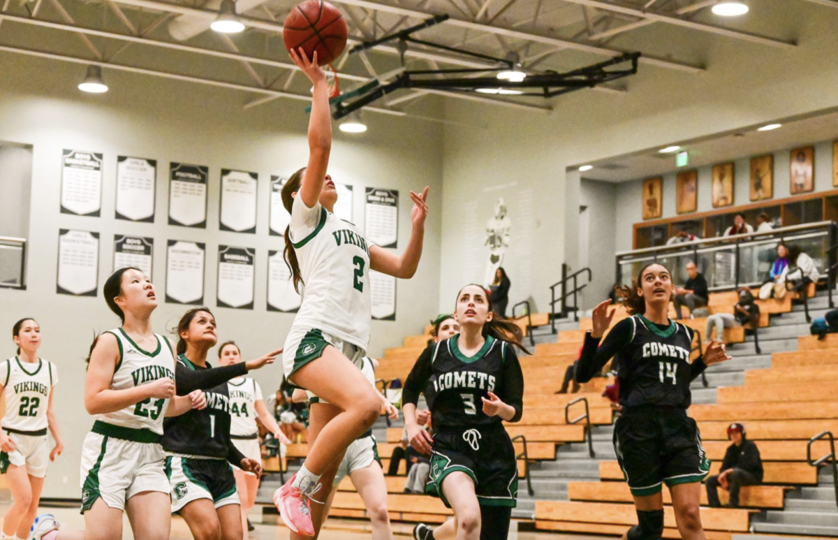 Viking sophomore guard Abigail Neumann scores a layup last season in a blow-out victory over the James Lick Comets. According to Viking junior guard Katie McCue, the Vikings this yeat are getting better with each game.
“Our team is building chemistry and improving more and more everyday ... each game is more exciting and fun,” McCue said.