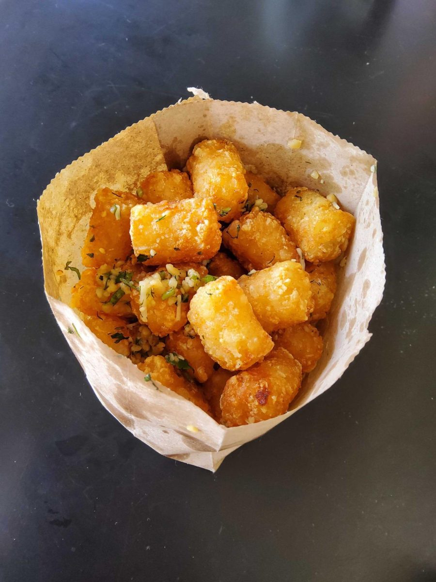 Parmesan Garlic Tots ($5) – Golden crisp potato tater tots with garlic, parmesan cheese, and parsley.