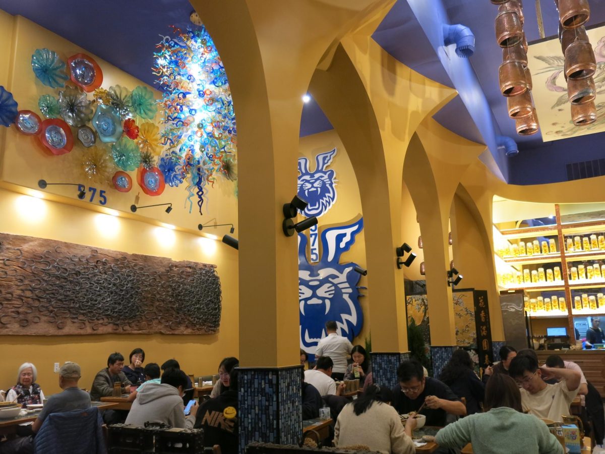 Under the watchful eye of a Flying Tiger mural, customers dine at 575 Miishien. Owner Jeff Wang said the art piece is much more than just a mascot. “Our branding is based on the friendship between China and America,” Wang said. “In the second world war in order to support the Chinese fight against the Japanese, a lot of fellow American soldiers went to China flight.”